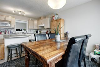 Photo 13: 10 Crystal Shores Cove: Okotoks Row/Townhouse for sale : MLS®# A1217849