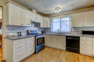 Photo 7: 5912 53 Street NW in Calgary: Dalhousie Detached for sale : MLS®# A1234355