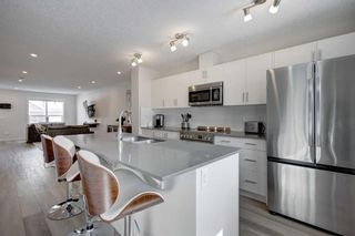 Photo 11: 253 Cranbrook Square SE in Calgary: Cranston Row/Townhouse for sale : MLS®# A2117728