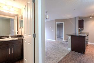 Photo 19: 211 403 Mackenzie Way SW: Airdrie Apartment for sale : MLS®# A2125740
