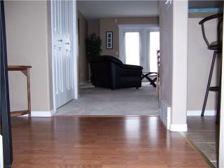 Photo 2: 26 103 FAIRWAYS Drive NW: Airdrie Townhouse for sale : MLS®# C3508067