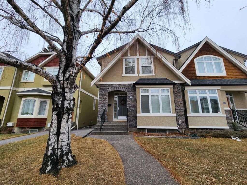Main Photo: 2626 6 Avenue NW in Calgary: West Hillhurst Semi Detached (Half Duplex) for sale : MLS®# A2100511