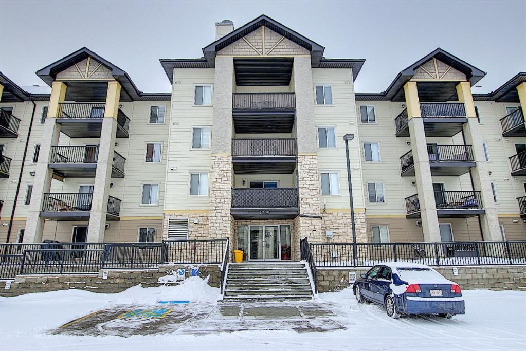 Main Photo: 7402 304 MacKenzie Way SW: Airdrie Apartment for sale : MLS®# A1081028