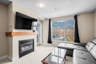 Photo 2: 409 1211 VILLAGE GREEN Way in Squamish: Downtown SQ Condo for sale in "Rockcliff at Eaglewind" : MLS®# R2864593