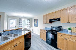 Photo 15: 104 Panamount Heights NW in Calgary: Panorama Hills Detached for sale : MLS®# A2004311