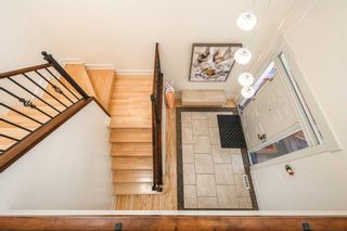 Photo 9: 222 Tremblant Place SW in Calgary: Springbank Hill Detached for sale : MLS®# A2125693