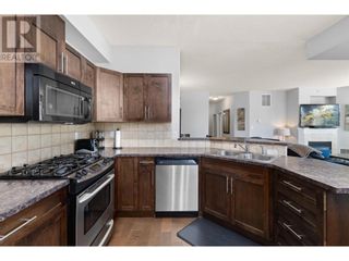 Photo 14: 1128 Sunset Drive Unit# 401 in Kelowna: House for sale : MLS®# 10306138