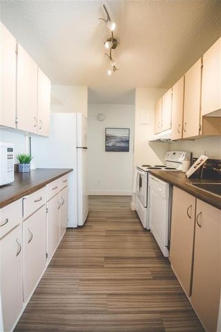 Photo 9: 301 720 Kenaston Boulevard in Winnipeg: River Heights Condominium for sale (1D)  : MLS®# 202227344