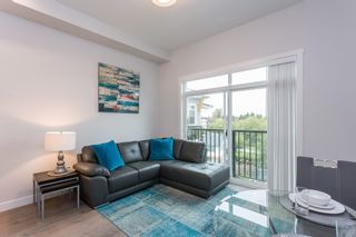 Photo 1: 405 19940 BRYDON Crescent in Langley: Langley City Condo for sale in "Brydon Green" : MLS®# R2755618