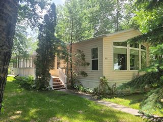 Photo 1: 49 Village Drive in Ste Anne: Paradise Village Residential for sale (R06)  : MLS®# 202308337