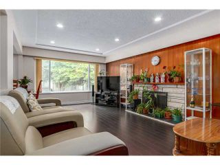 Photo 2: 5255 CHAMBERS Street in Vancouver: Collingwood VE House for sale in "NORQUAY VILLAGE" (Vancouver East)  : MLS®# V1072301