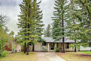 Photo 1: 115 Silver Brook Road NW in Calgary: Silver Springs Detached for sale : MLS®# A1227578