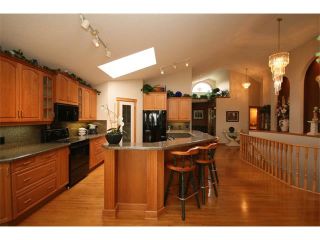 Photo 13: 315 GLENEAGLES View: Cochrane House for sale : MLS®# C4014401