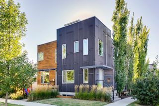 Photo 1: 1009 4 Avenue NE in Calgary: Bridgeland/Riverside Semi Detached (Half Duplex) for sale : MLS®# A1258563