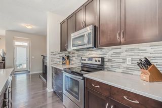 Photo 7: 723 Walden Drive SE in Calgary: Walden Semi Detached (Half Duplex) for sale : MLS®# A2038003