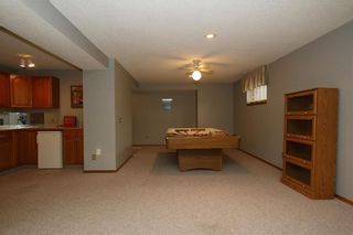 Photo 34: 2 WEST ANDISON Close: Cochrane House for sale : MLS®# C4141938
