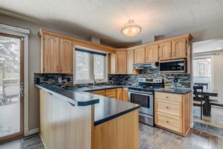 Photo 10: 331 Ranchridge Bay NW in Calgary: Ranchlands Detached for sale : MLS®# A1203048