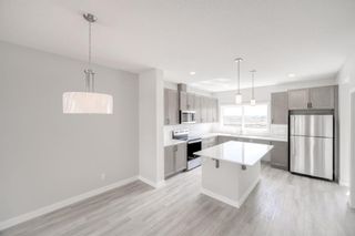 Photo 14: 306 Creekside Boulevard SW in Calgary: C-168 Semi Detached (Half Duplex) for sale : MLS®# A1254336