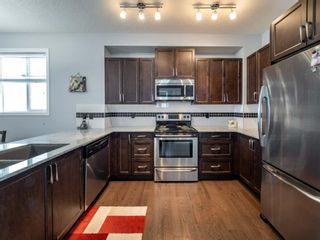 Photo 9: 33 Nolanfield Manor NW in Calgary: Nolan Hill Detached for sale : MLS®# A1056924