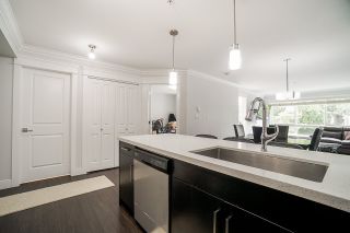 Photo 1: 201 2268 SHAUGHNESSY Street in Port Coquitlam: Central Pt Coquitlam Condo for sale in "UPTOWN POINT" : MLS®# R2485600