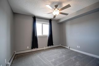 Photo 17: 9413 403 Mackenzie Way SW: Airdrie Apartment for sale : MLS®# A1201272