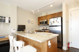 Photo 2: 318 1211 VILLAGE GREEN Way in Squamish: Downtown SQ Condo for sale in "ROCKCLIFF AT EAGLEWIND" : MLS®# R2372303