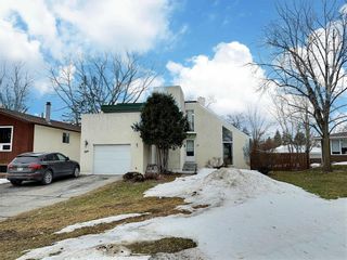 Photo 2: 50 LaVerendrye Crescent in Portage La Prairie: House for sale : MLS®# 202308362