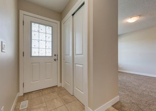 Photo 2: 59 Fireside Parkway: Cochrane Row/Townhouse for sale : MLS®# A2053037
