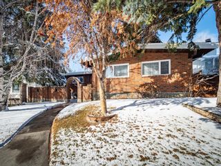 Photo 1: 6411 70 Street NW in Calgary: Silver Springs Detached for sale : MLS®# A1086584