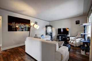 Photo 2: 4 & 6 Winslow Crescent SW in Calgary: Westgate Duplex for sale : MLS®# A1225941