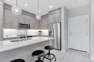 Photo 4: 205 383 Smith Street NW in Calgary: University District Apartment for sale : MLS®# A2107452