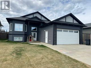 Photo 1: 204 13 Street SE in Slave Lake: House for sale : MLS®# A2112109