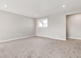 Photo 15: 306 Rowley Way NW in Calgary: C-483 Detached for sale : MLS®# A2001387