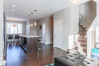 Photo 4: 153 PANATELLA Square NW in Calgary: Panorama Hills Row/Townhouse for sale : MLS®# C4305575