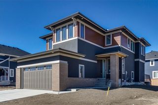 Photo 1: 152 ROCK LAKE View NW in Calgary: Rocky Ridge Detached for sale : MLS®# A1062711