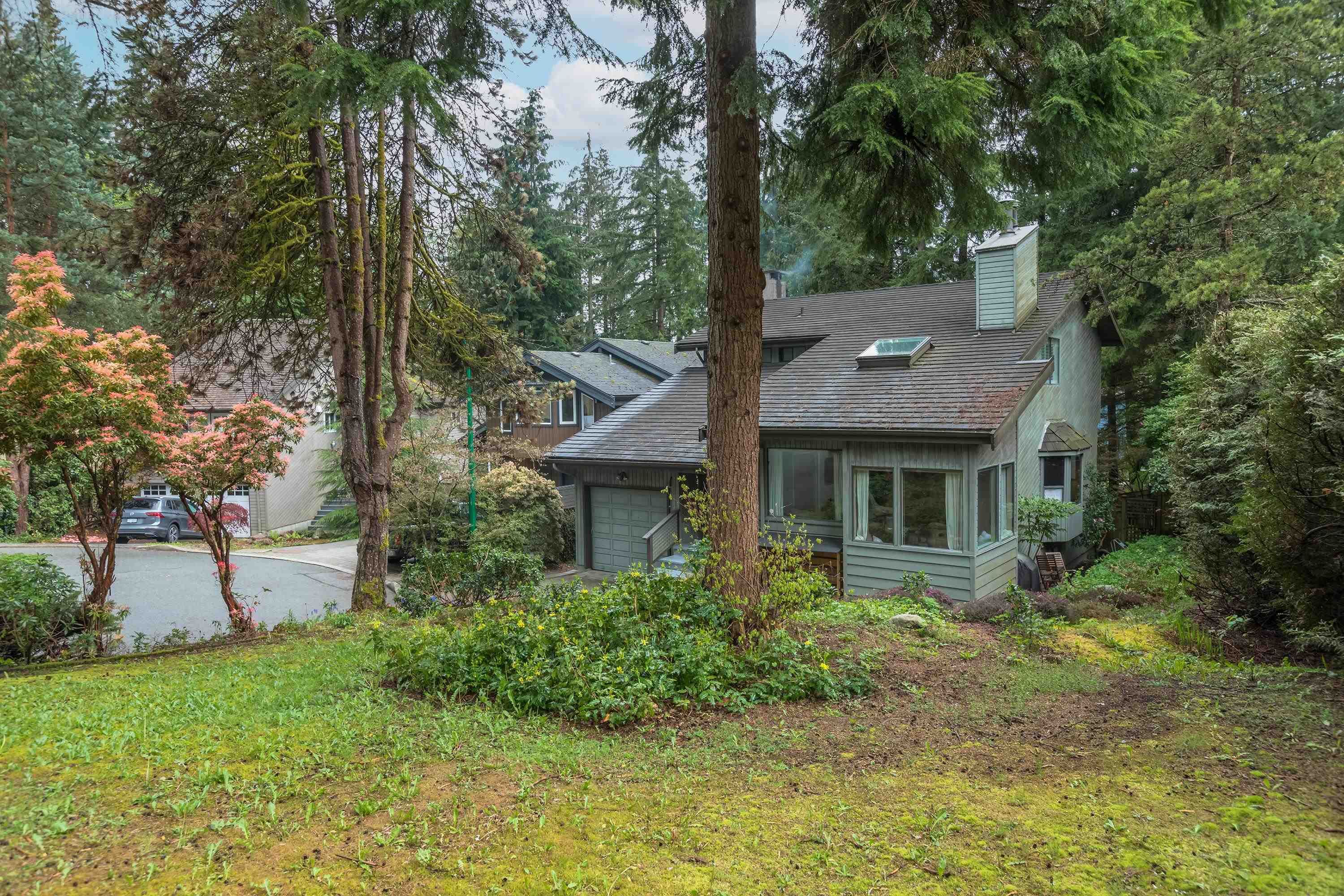 Main Photo: 5597 HUCKLEBERRY Place in North Vancouver: Grouse Woods House for sale in "GROUSEWOODS" : MLS®# R2775982