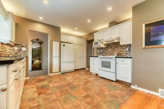 Photo 10: 91 Cumberland Drive NW in Calgary: Cambrian Heights Detached for sale : MLS®# A2020911