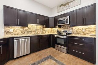 Photo 4: 502 138 18 Avenue SE in Calgary: Mission Apartment for sale : MLS®# A2138911