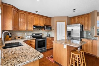 Photo 10: 320 Waterstone Place SE: Airdrie Detached for sale : MLS®# A1230399