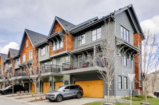 Photo 2: 304 Ascot Circle SW in Calgary: Aspen Woods Row/Townhouse for sale : MLS®# A1217542