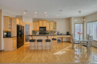 Photo 11: 85 Everwillow Boulevard SW in Calgary: Evergreen Detached for sale : MLS®# A2030591