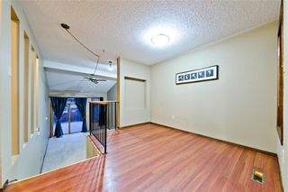 Photo 3: EDGEMONT ESTATES DR NW in Calgary: Edgemont House for sale : MLS®# C4221851