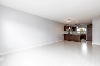 Photo 12: 404 Covecreek Circle NE in Calgary: Coventry Hills Row/Townhouse for sale : MLS®# A1217696