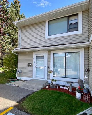 Photo 1: 211 Pinestream Place NE in Calgary: Pineridge Row/Townhouse for sale : MLS®# A2080596