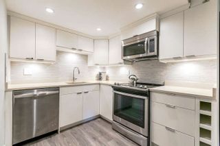 Photo 1: 107 215 N TEMPLETON Drive in Vancouver: Hastings Condo for sale in "PORTO VISTA" (Vancouver East)  : MLS®# R2155798