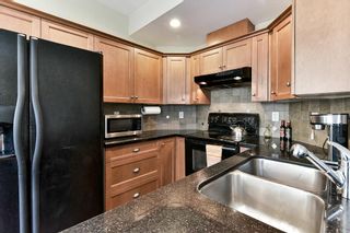 Photo 8: 7036 179A Street in Surrey: Cloverdale BC Condo for sale in "TERRACES AT PROVINCETON" (Cloverdale)  : MLS®# R2148271