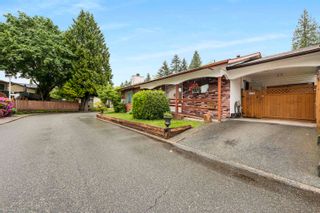 Main Photo: 1908 PARKLAND Drive in Coquitlam: River Springs House for sale in "River Springs" : MLS®# R2890608