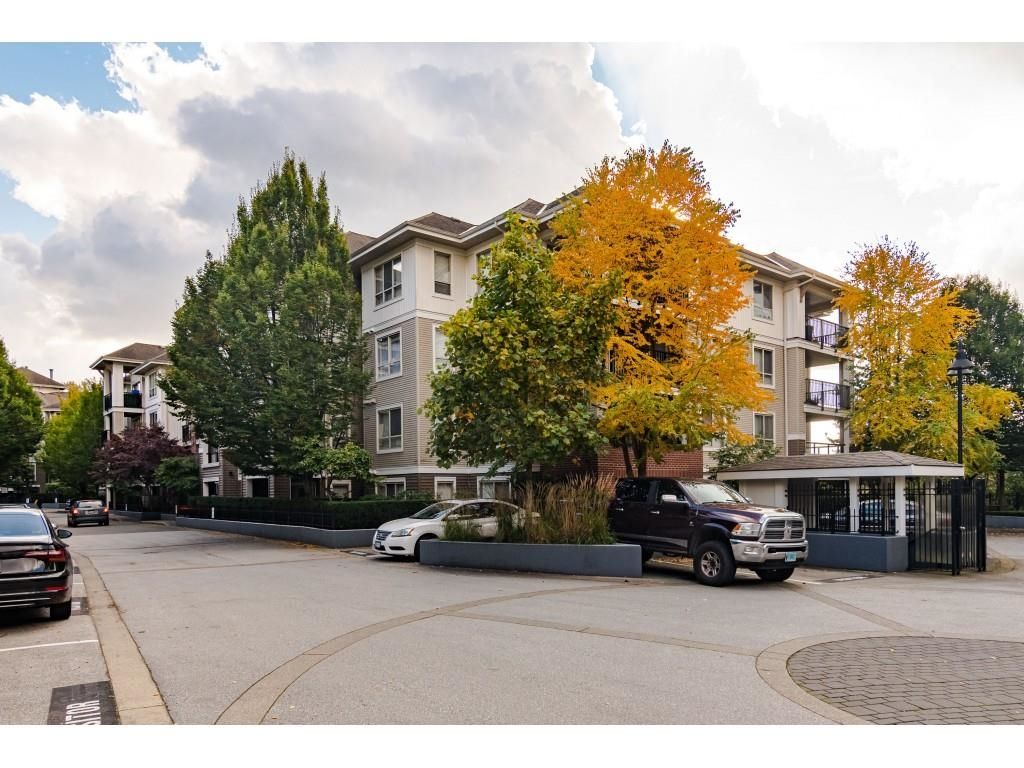 Main Photo: C216 8929 202 Street in Langley: Walnut Grove Condo for sale in "The Grove" : MLS®# R2649679