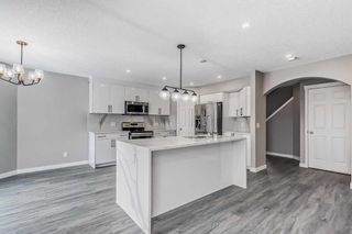 Photo 5: 15785 Everstone Road SW in Calgary: Evergreen Detached for sale : MLS®# A2100834