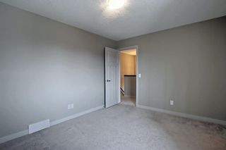 Photo 14: 115 Everhollow Street SW in Calgary: Evergreen Detached for sale : MLS®# A1145858